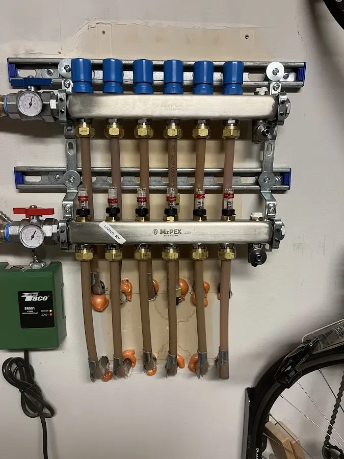 Plumber performing Leak Detection at a residential property in Foster