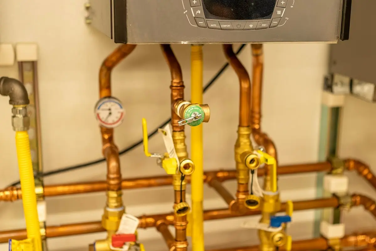 Licensed technician providing Backflow Prevention for a homeowner in Foster